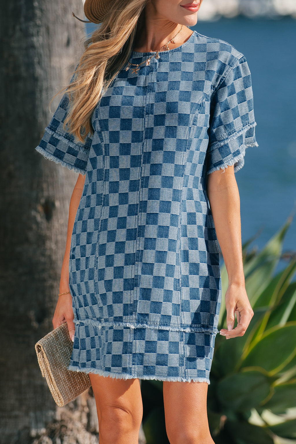 Sky blue checkered denim mini dress with frayed hem from Dear-Lover, featuring a casual sleeveless design and cotton-polyester fabric.
