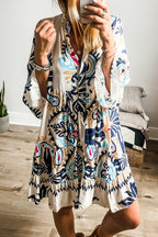 White printed tribal mini dress with bracelet sleeves and button details, made from polyester, by Dear-Lover.