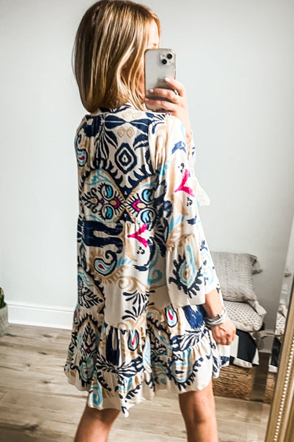 White printed tribal design mini dress with bracelet sleeves and button closure, made of polyester, by Dear-Lover.