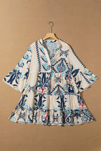 White printed tribal mini dress with bracelet sleeves and button details by Dear-Lover, made of lightweight polyester fabric.