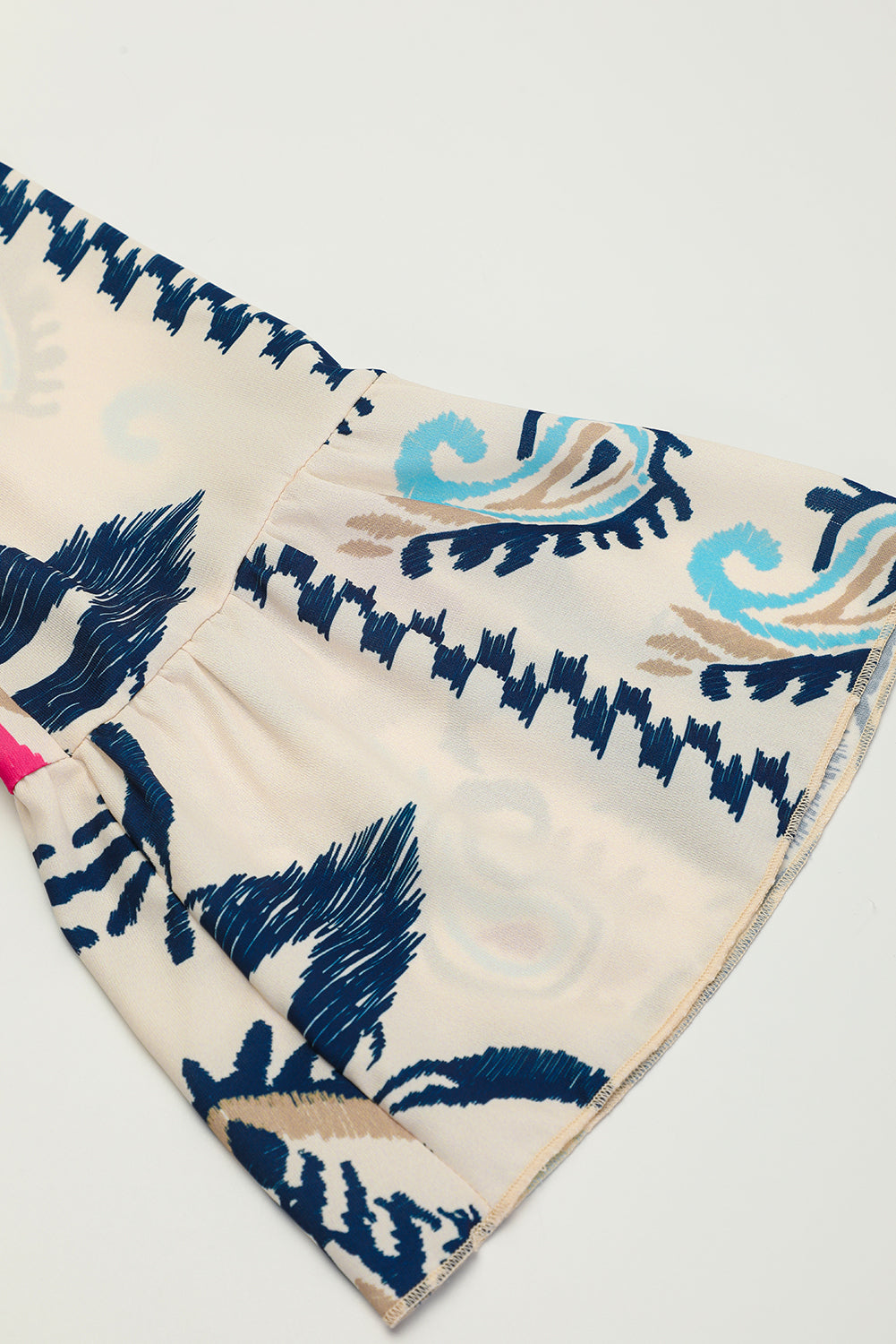 White printed tribal mini dress with bracelet sleeves and buttoned front, made of lightweight polyester by Dear-Lover.