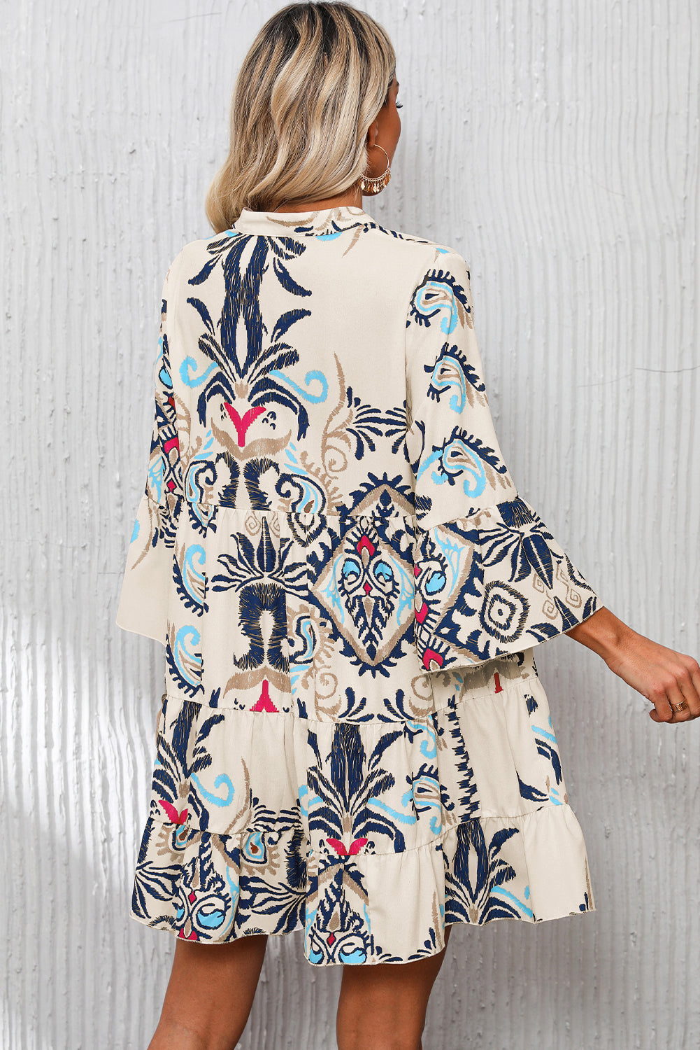 White printed tribal mini dress with bracelet sleeves and buttoned front by Dear-Lover, featuring a casual, stylish design.