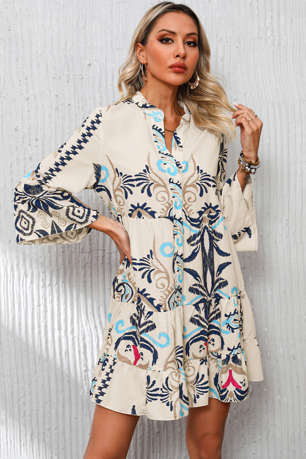 White printed tribal mini dress with bracelet sleeves and buttoned front, made of lightweight polyester, by Dear-Lover.