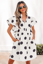 White polka dot print mini dress by Dear-Lover with ruffled short sleeves, half-button front, and loose fit in polyester fabric.