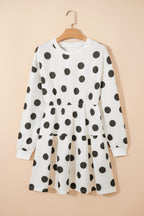 White polka dot printed long sleeve flared mini dress by Dear-Lover, featuring a fitted waist and playful pattern.