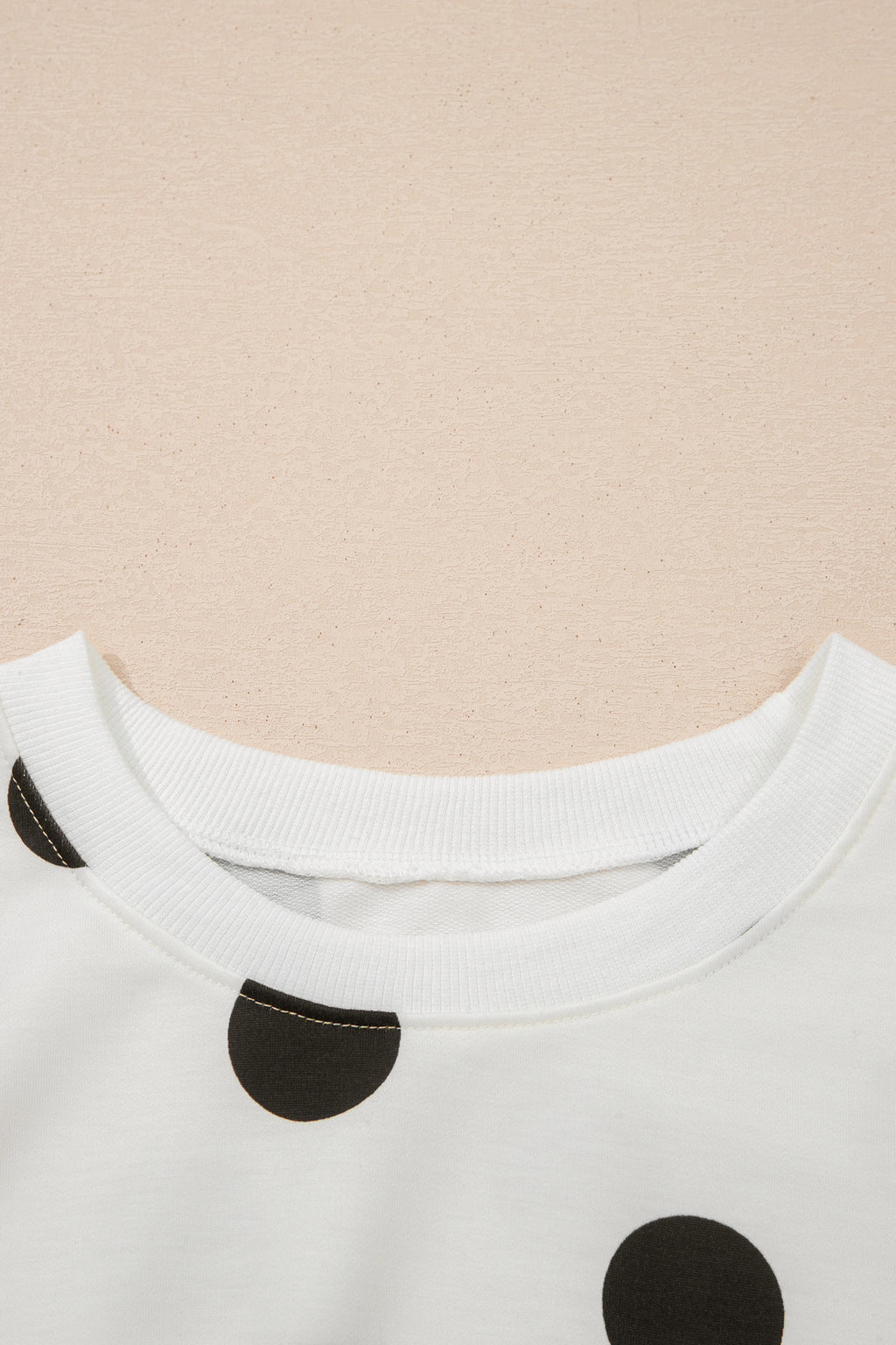 White polka dot printed long sleeve flared mini dress by Dear-Lover, featuring a fitted waist and classic mini length.