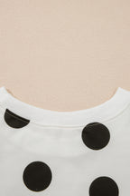 White polka dot printed long sleeve flared mini dress by Dear-Lover, featuring a fitted waist and playful pattern.
