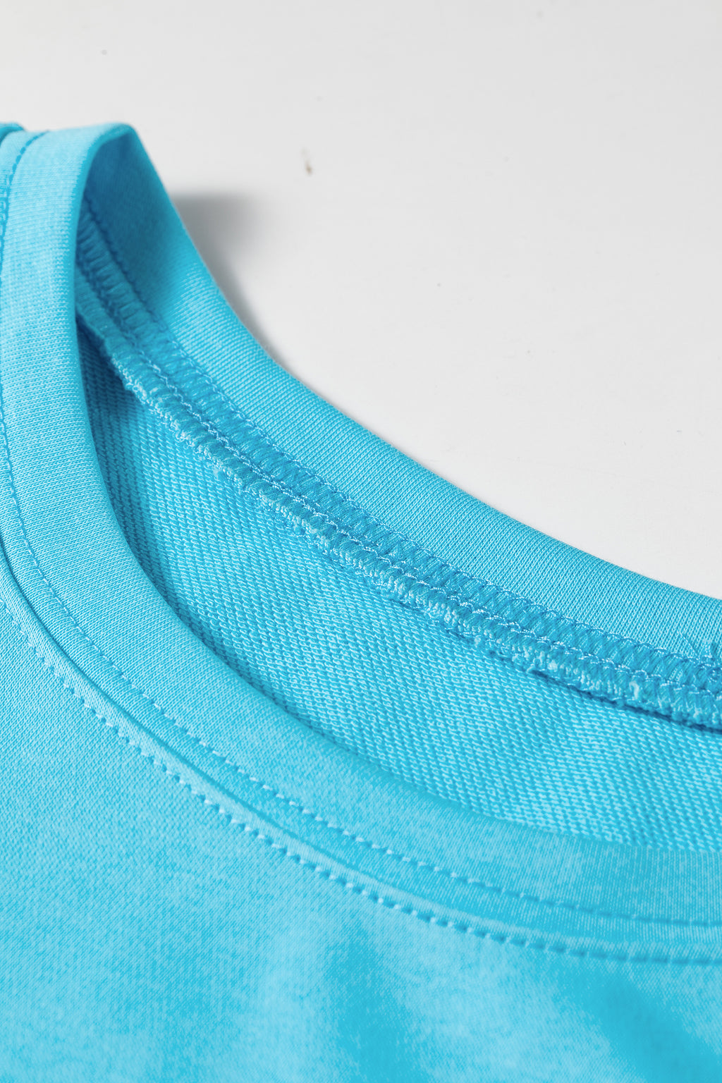 Light blue drop shoulder casual T-shirt mini dress by Dear-Lover, loose fit with short sleeves, made of 80% cotton and 20% polyester.
