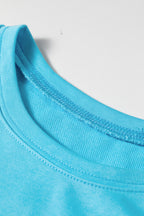 Light blue drop shoulder casual T-shirt mini dress by Dear-Lover, loose fit with short sleeves, made of 80% cotton and 20% polyester.