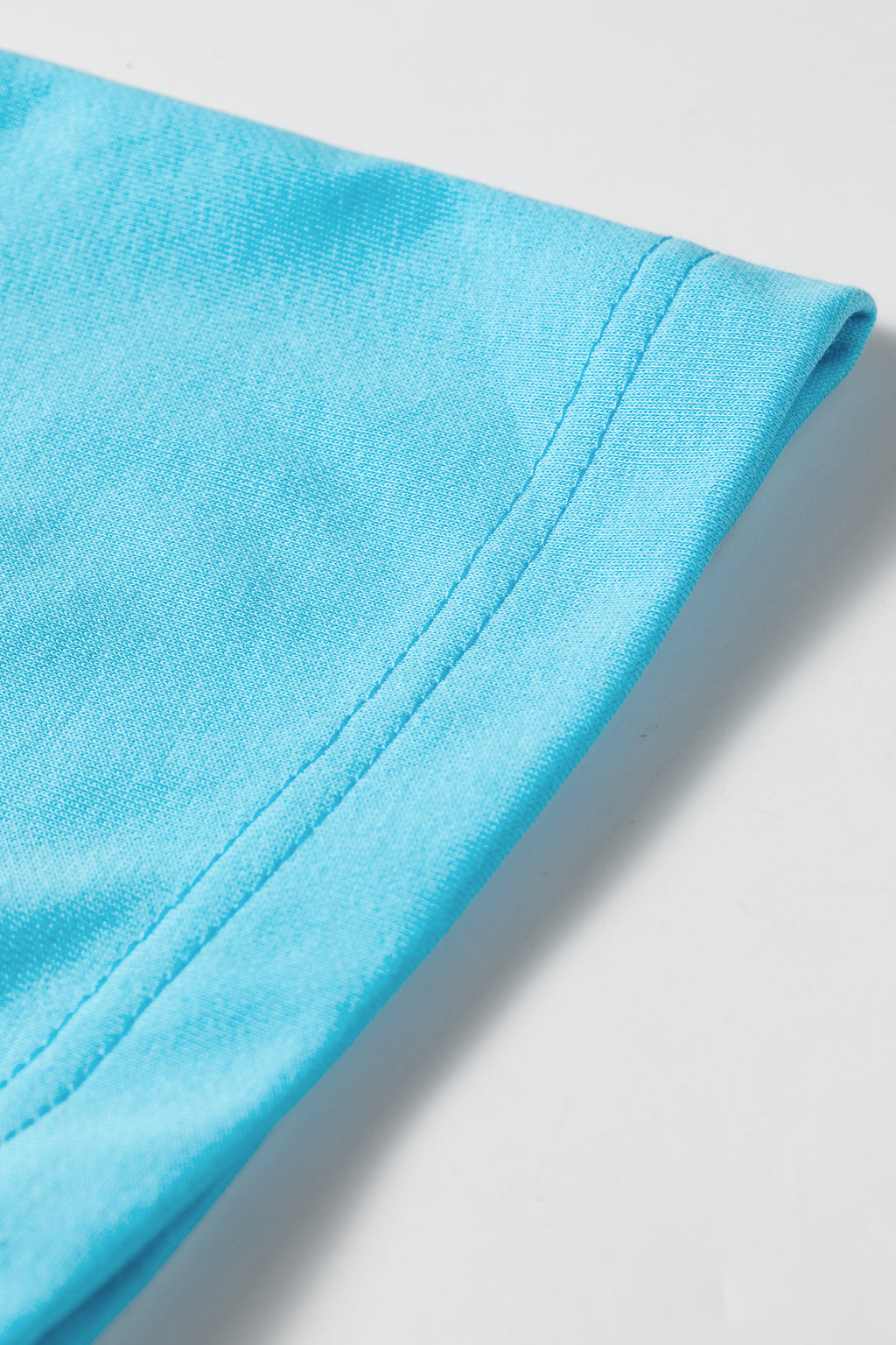 Light blue drop shoulder casual T-shirt mini dress by Dear-Lover, made of cotton and polyester, loose fit, short sleeves.