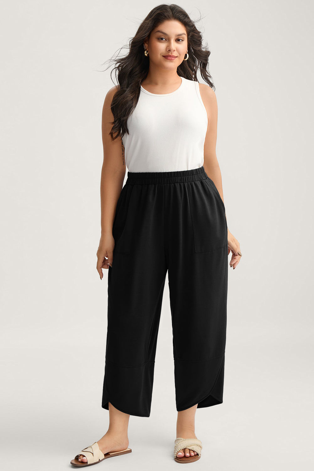 Plus size Sail Blue elastic waist asymmetrical hem loose capris pants by Dear-Lover, made of polyester, cotton, and elastane.