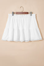 Plus size boho ruffled shorts with lace trim, elastic waist, and frilled details, ideal for relaxed, stylish summer wear.
