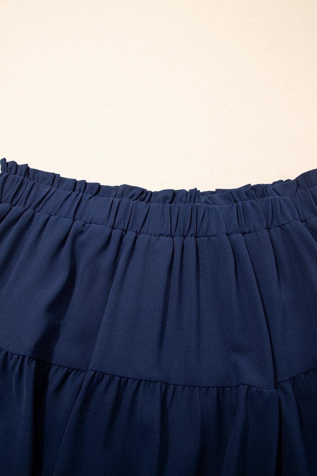 Plus size boho ruffled shorts with elastic waist and lace trim, featuring a stylish, comfortable fit in a floral design.