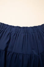 Plus size boho ruffled shorts with elastic waist and lace trim, featuring a stylish, comfortable fit in a floral design.