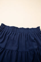 Plus size boho ruffled shorts with elastic waist and lace trim, featuring a frilled design for a stylish, comfortable fit.