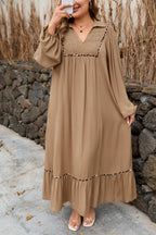 Plus size chestnut maxi dress with smocked V-neckline, leopard piping accents, and bracelet detail, made from viscose fabric.