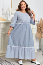 Sky blue stripe plus size maxi dress with crisscross lace details, mixed striped patchwork, and a flowy shift silhouette.