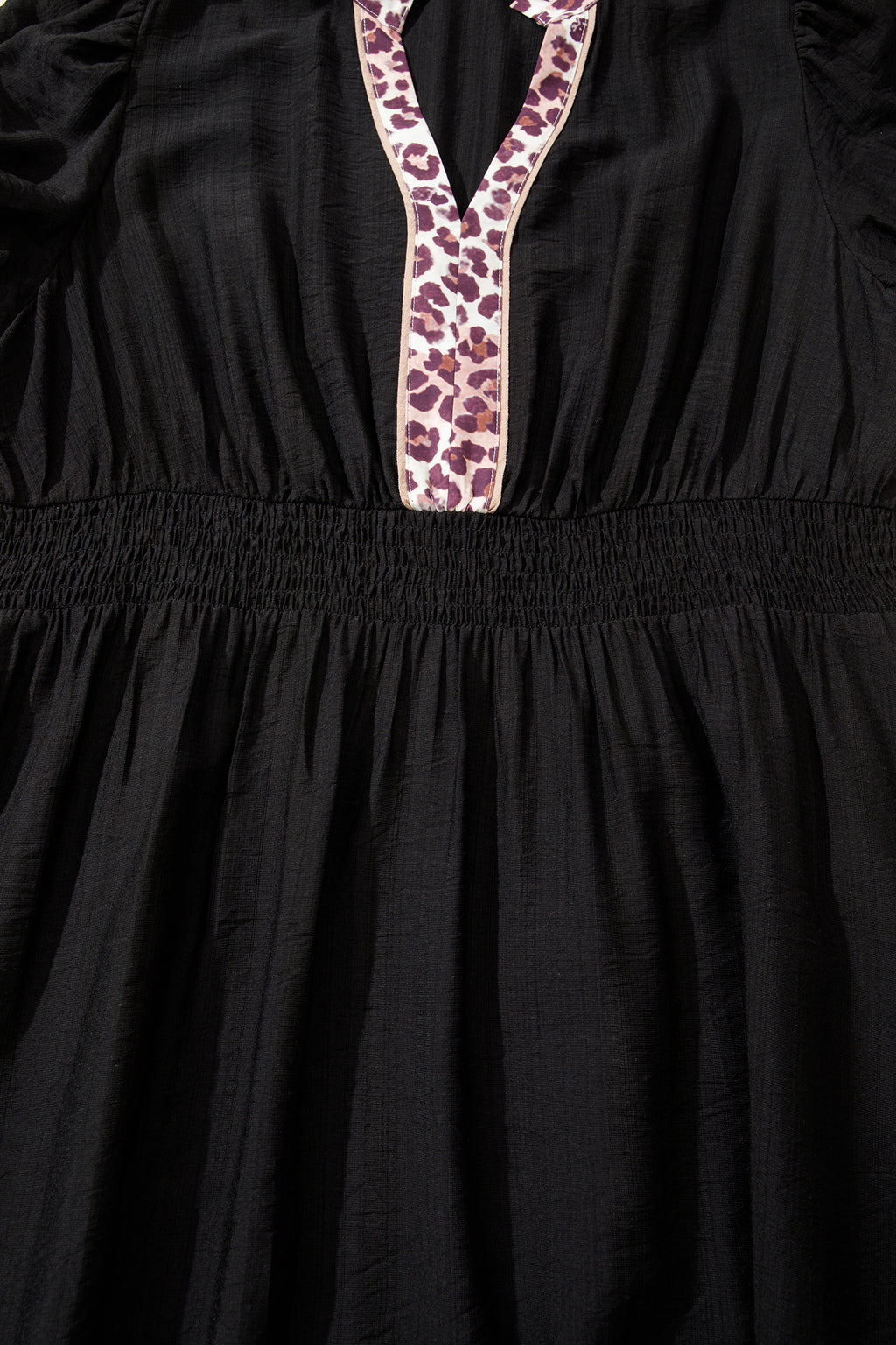 Black leopard print plus size midi dress with V-neck, patchwork details, smocked waist, and ruffled hem from Dear-Lover.