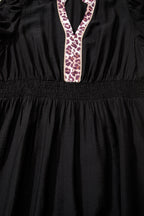 Black leopard print plus size midi dress with V-neck, patchwork details, smocked waist, and ruffled hem from Dear-Lover.