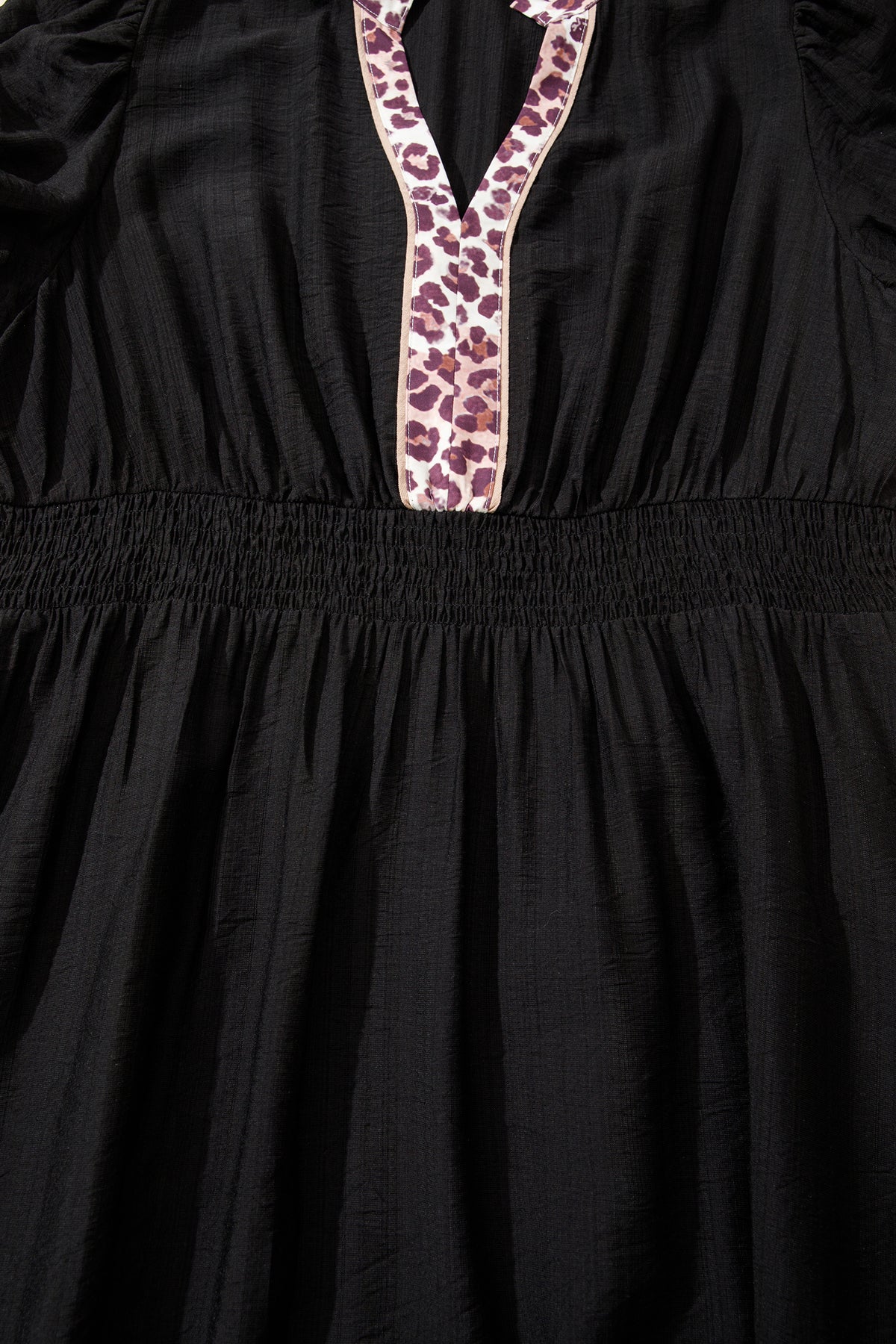 Black leopard print plus size midi dress with V-neck, patchwork details, smocked waist, and ruffled hem from Dear-Lover.