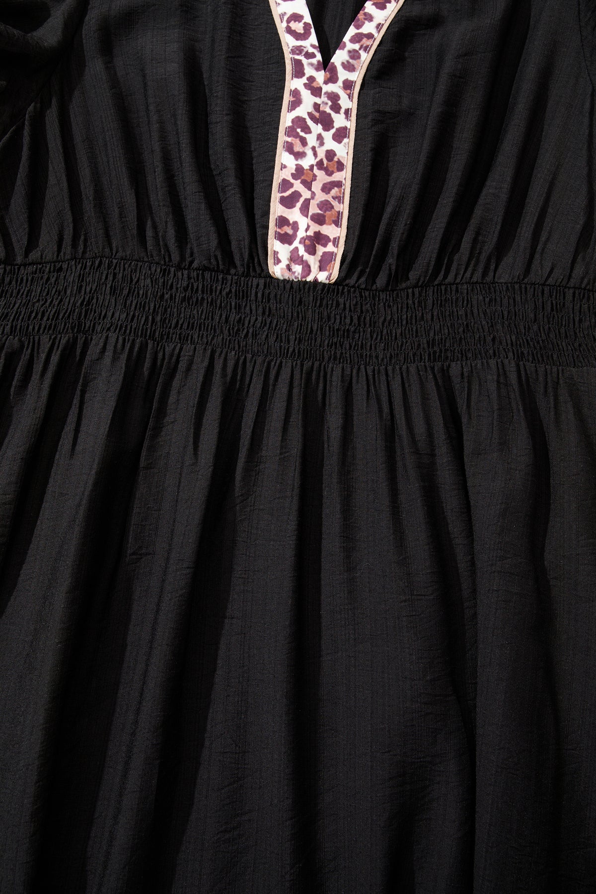 Black leopard print plus size midi dress with V-neck, patchwork design, smocked waist, and ruffled hem by Dear-Lover.