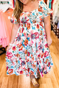 White floral plus size midi dress with square neckline, puff sleeves, and flowy silhouette by Dear-Lover.