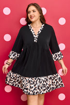 Black plus size leopard patchwork mini dress with V-neck, 3/4 sleeves, and ruffle hem, by Dear-Lover.