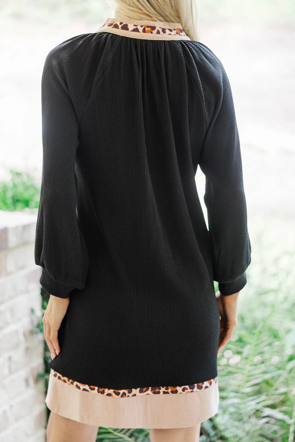 Black plus size ribbed dress with contrast color block and leopard trim from Dear-Lover, mini length and comfortable fit.