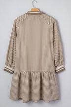 Khaki stripe plus size mini dress with zip-up collar, puff sleeves, and ruffled details, made of polyester and cotton blend.
