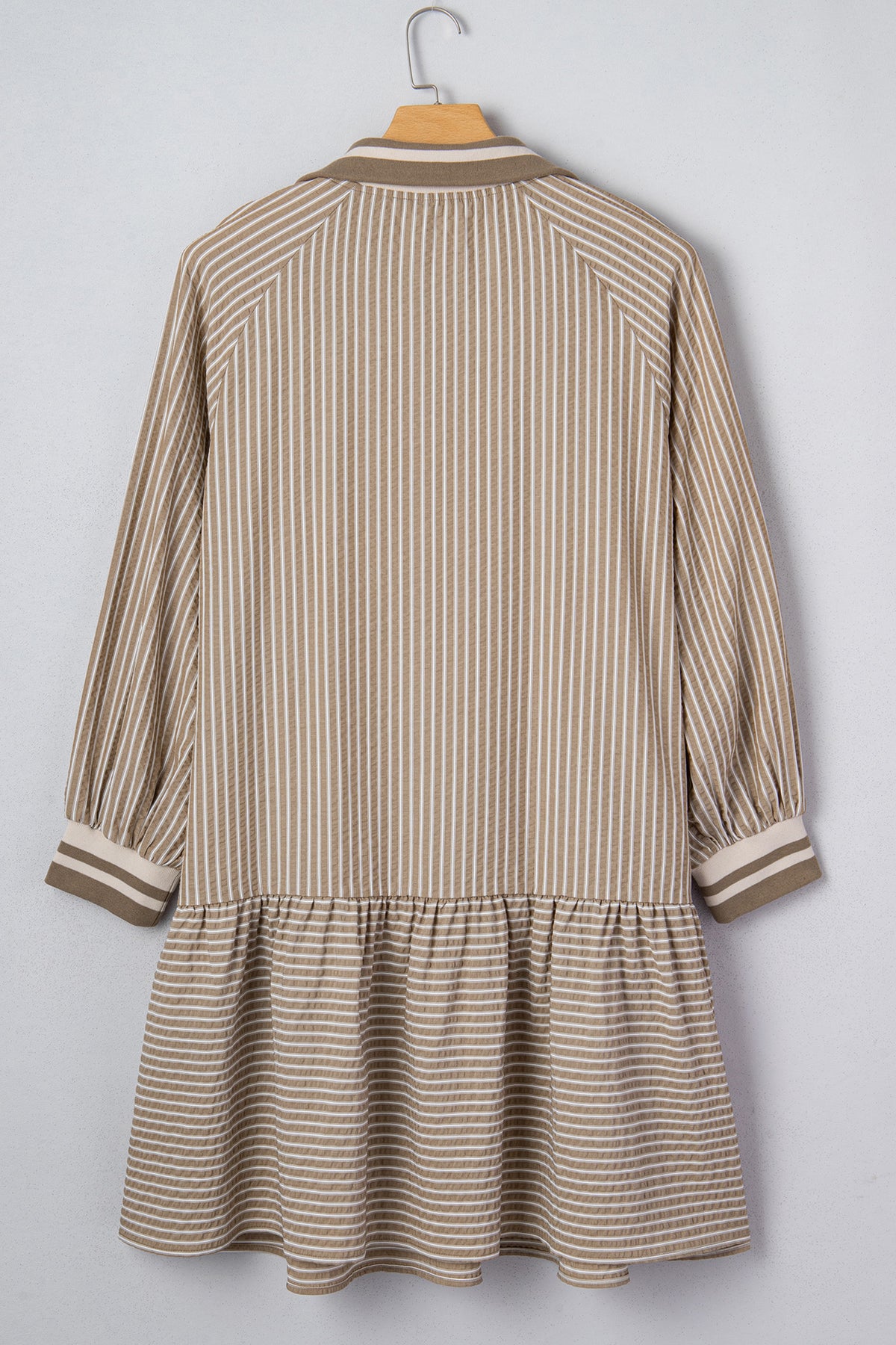 Khaki stripe plus size mini dress with zip-up collar, puff sleeves, and ruffled details, made of polyester and cotton blend.