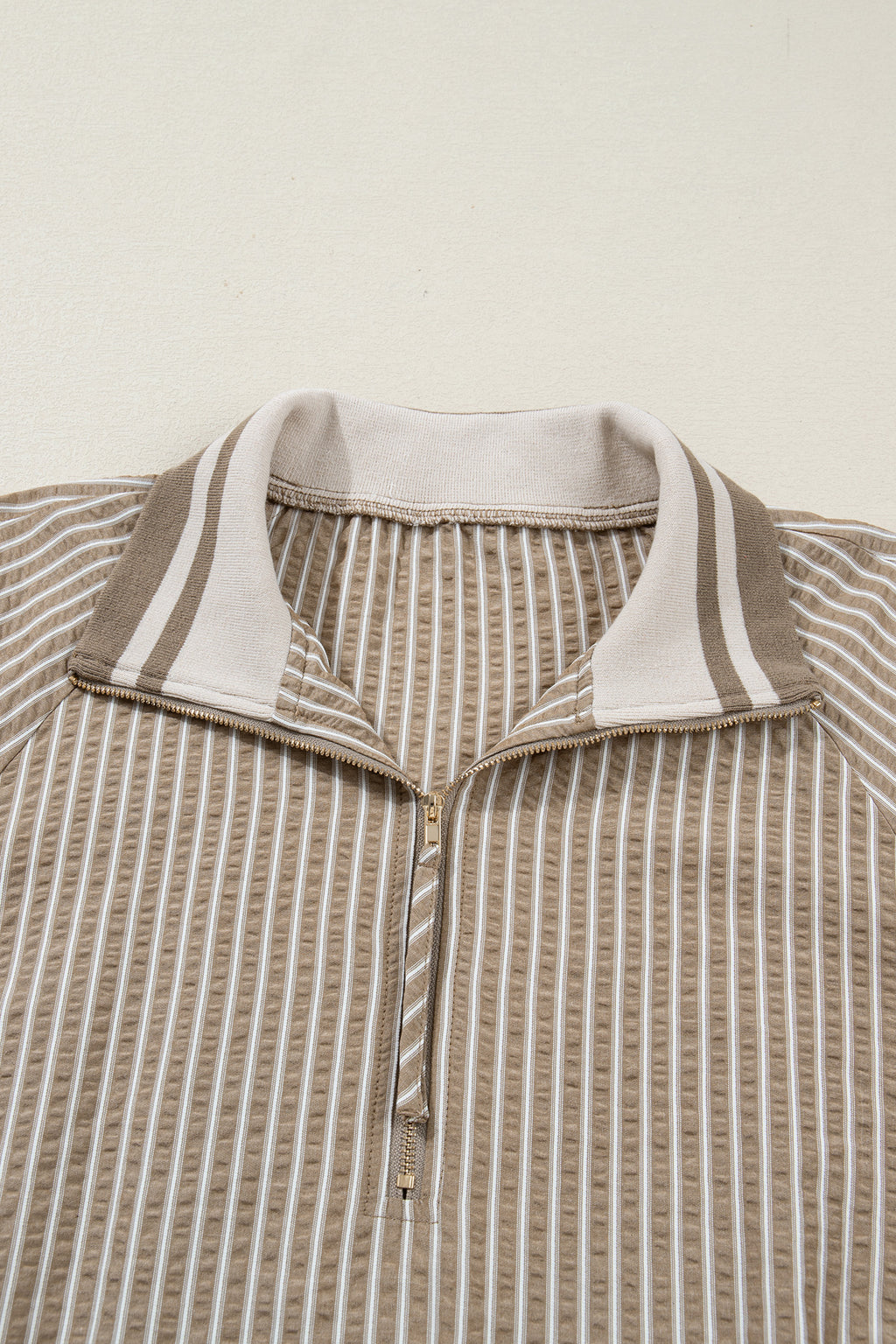 Khaki stripe zip-up collared plus size mini dress with puff sleeves and ruffled details, made of polyester and cotton blend.