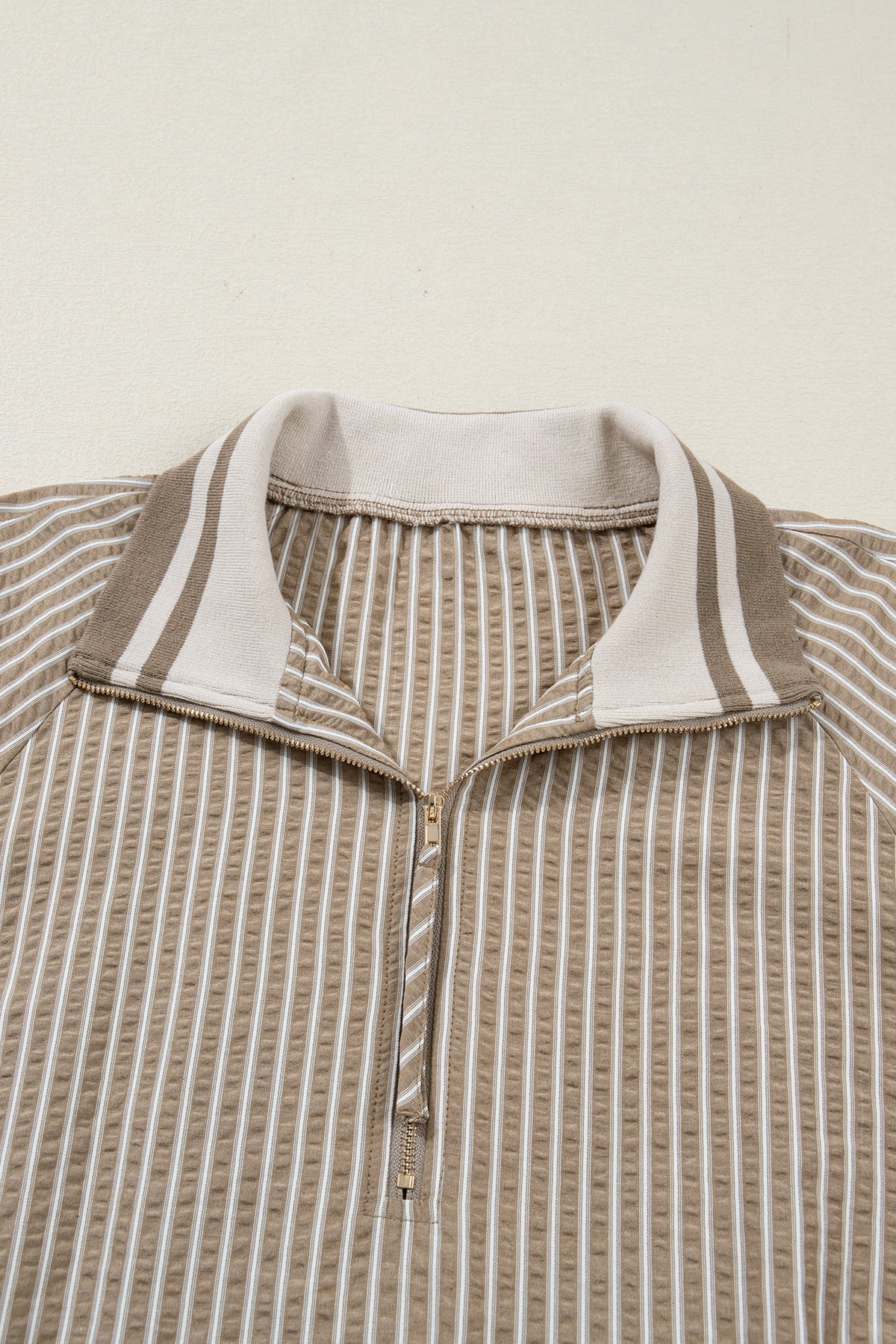 Khaki stripe zip-up collared plus size mini dress with puff sleeves and ruffled details, made of polyester and cotton blend.
