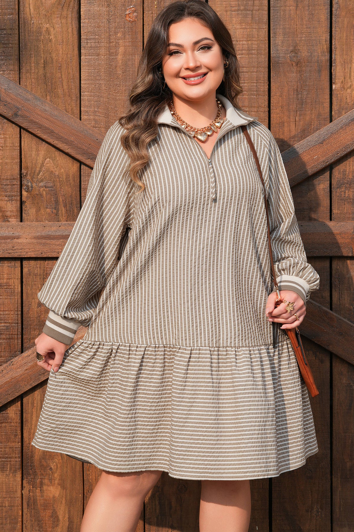 Plus size khaki stripe mini dress with zip-up collar, puff sleeves, and ruffled details by Dear-Lover.