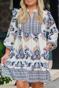 Sky blue plus size boho print mini dress with split neck and long sleeves, made of viscose and polyamide, by Dear-Lover.