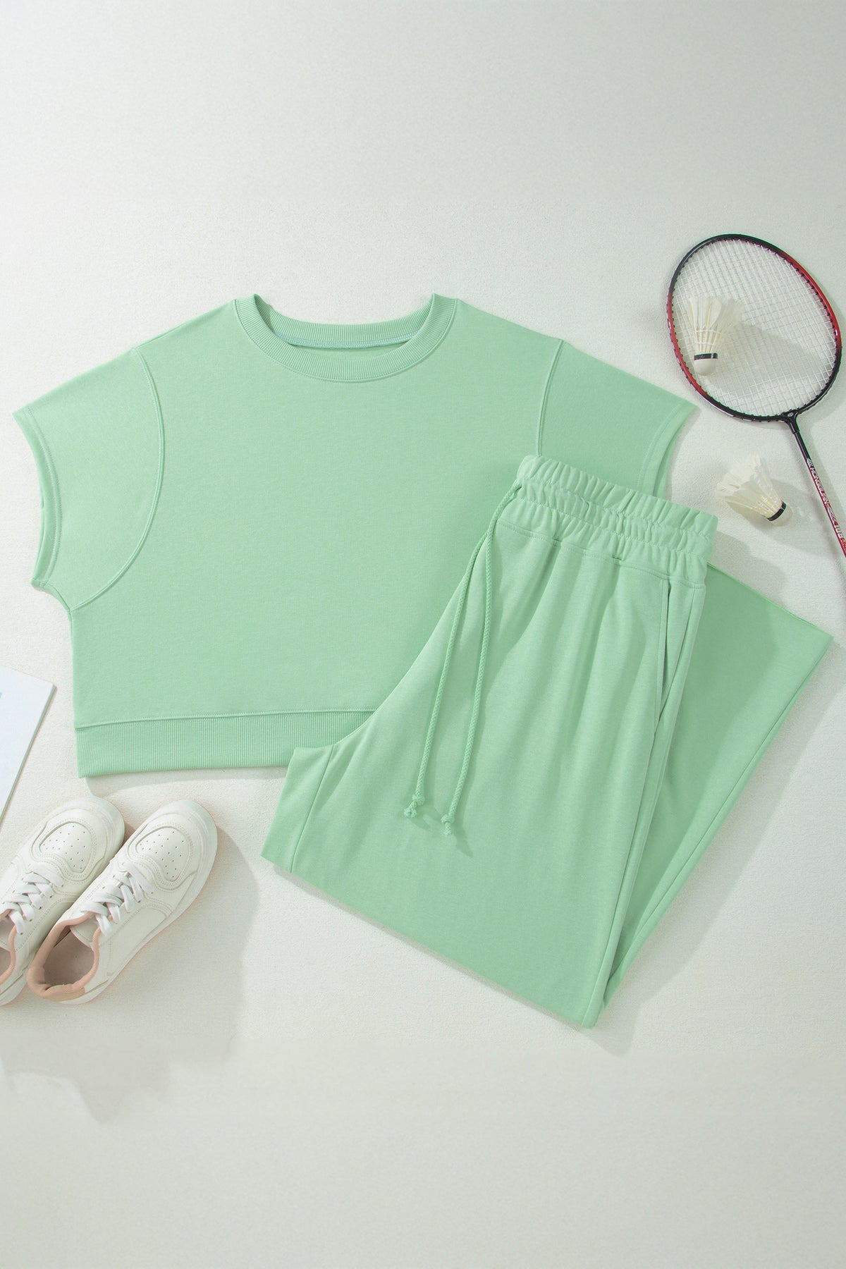 Plus size Mist Blue loungewear set with ribbed trim short sleeve top and drawstring loose pants, made of polyester and cotton blend.