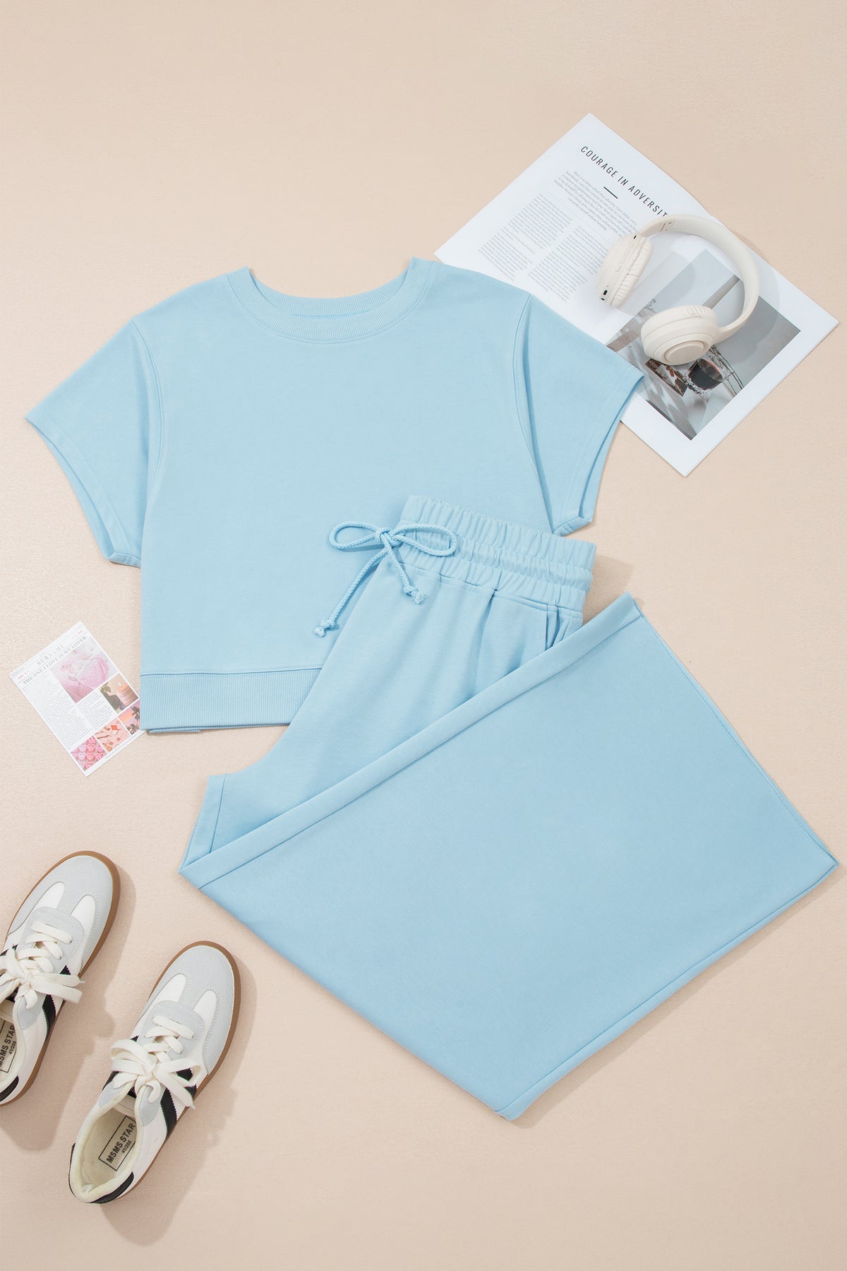 Plus size Mist Blue loungewear set with ribbed trim short sleeve top and drawstring loose pants, made of polyester and cotton.