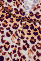 Brown plus size leopard print blouse with frilled stand collar, made from viscose, stylish and comfortable for plus size women.