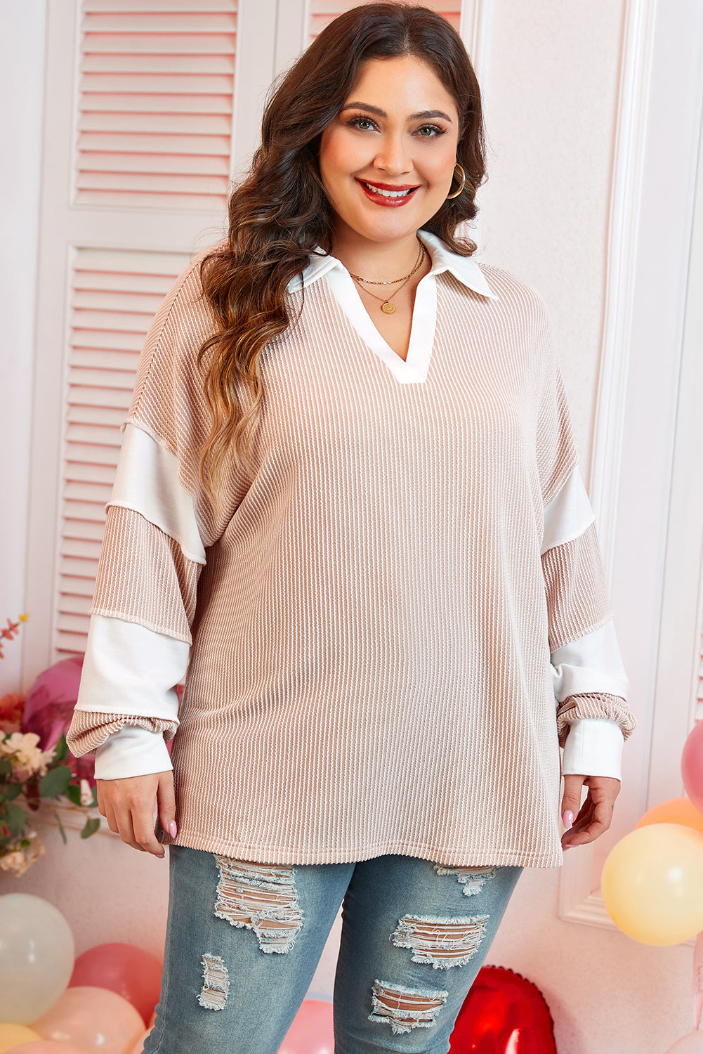 Plus size long sleeve top by Dear-Lover with parchment colorblock design, slit V-neck, corded detail, and comfortable fabric blend.
