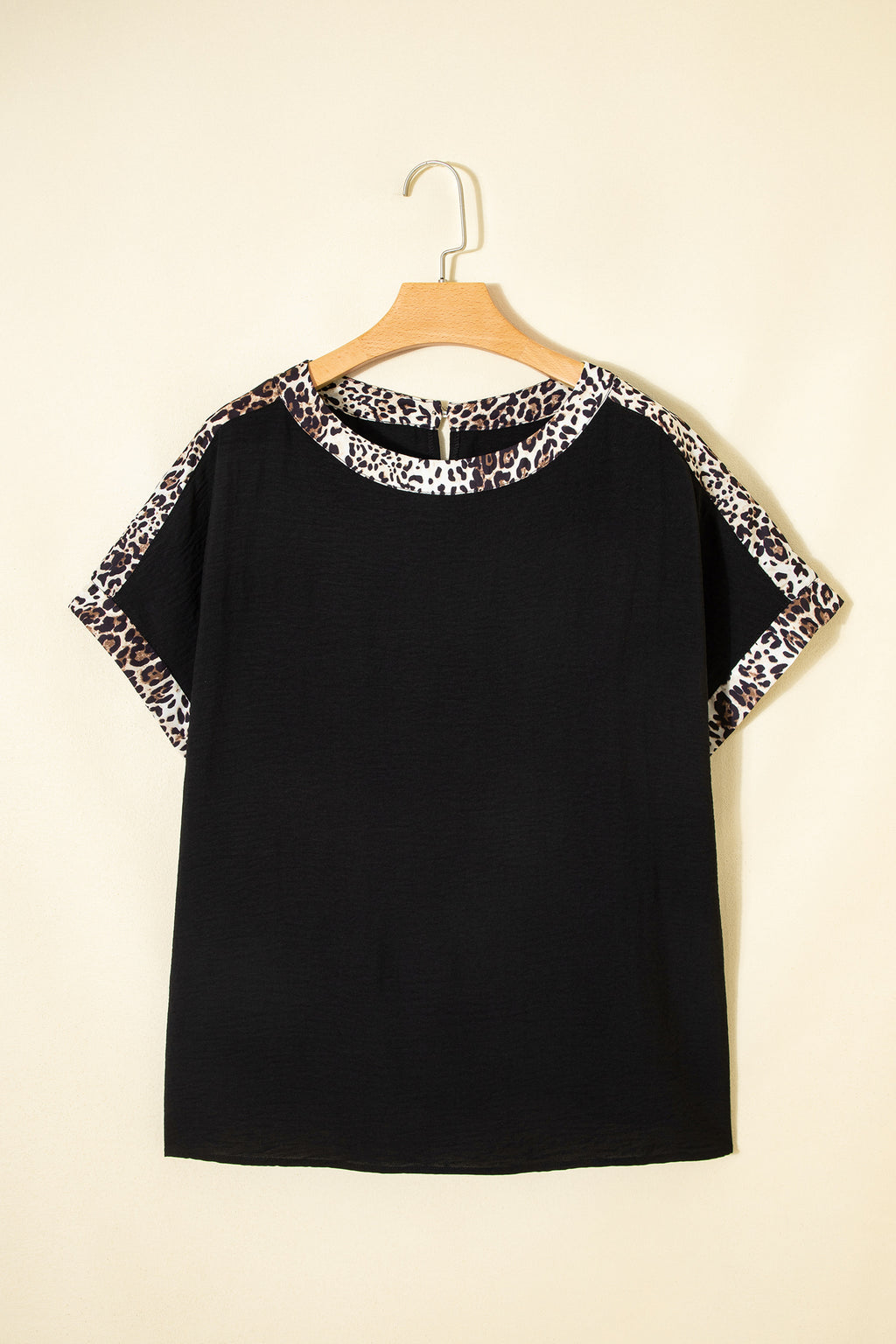 Black plus size leopard patchwork round neck loose tee by Dear-Lover, showcasing a relaxed fit and stylish leopard print design.