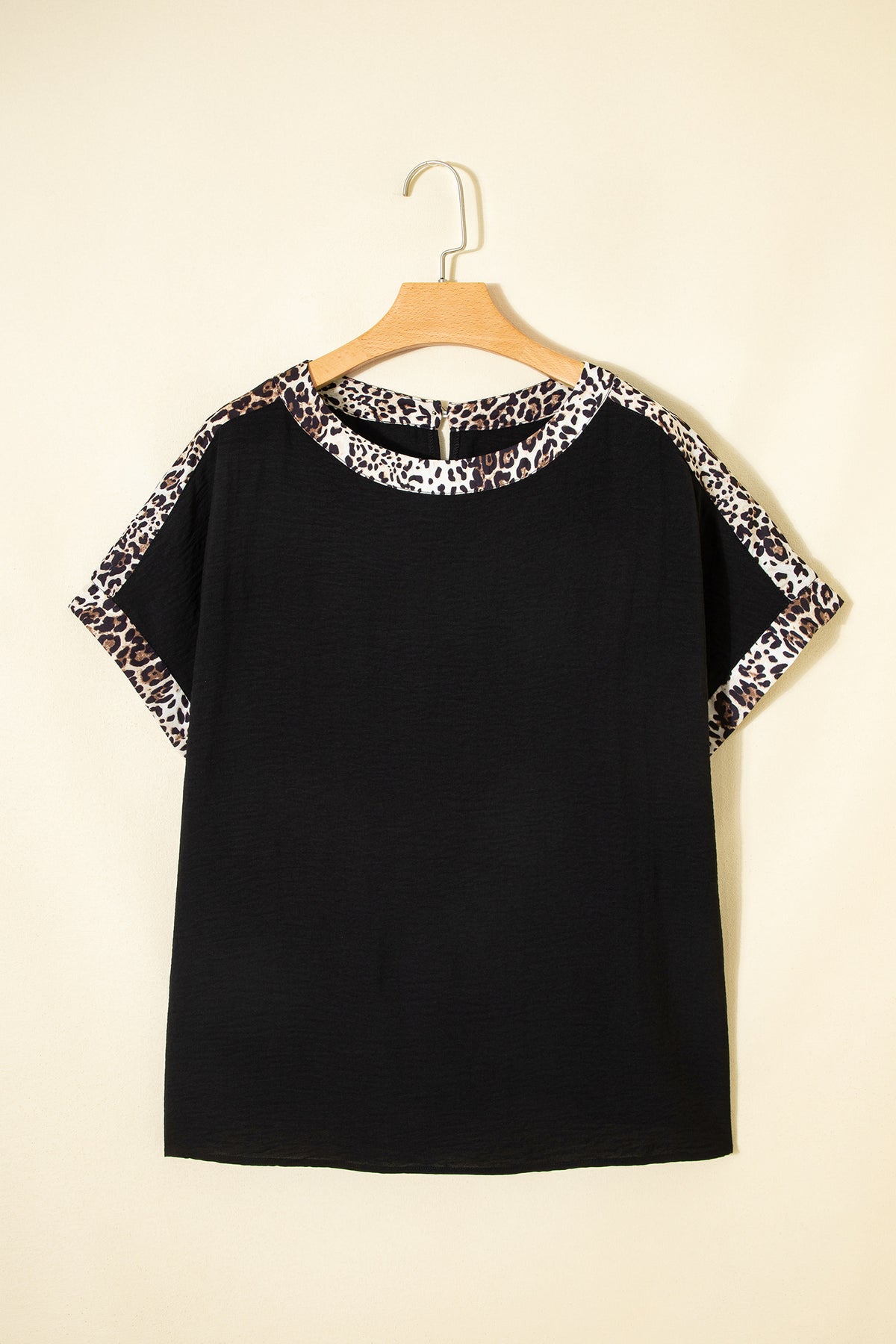 Black plus size leopard patchwork round neck loose tee by Dear-Lover, showcasing a relaxed fit and stylish leopard print design.