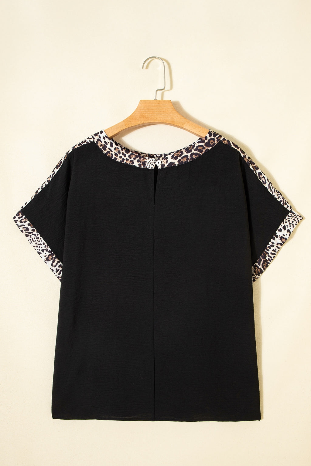 Black plus size leopard patchwork round neck loose tee by Dear-Lover, showcasing a relaxed fit and stylish leopard print design.