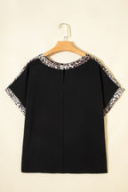 Black plus size leopard patchwork round neck loose tee by Dear-Lover, showcasing a relaxed fit and stylish leopard print design.