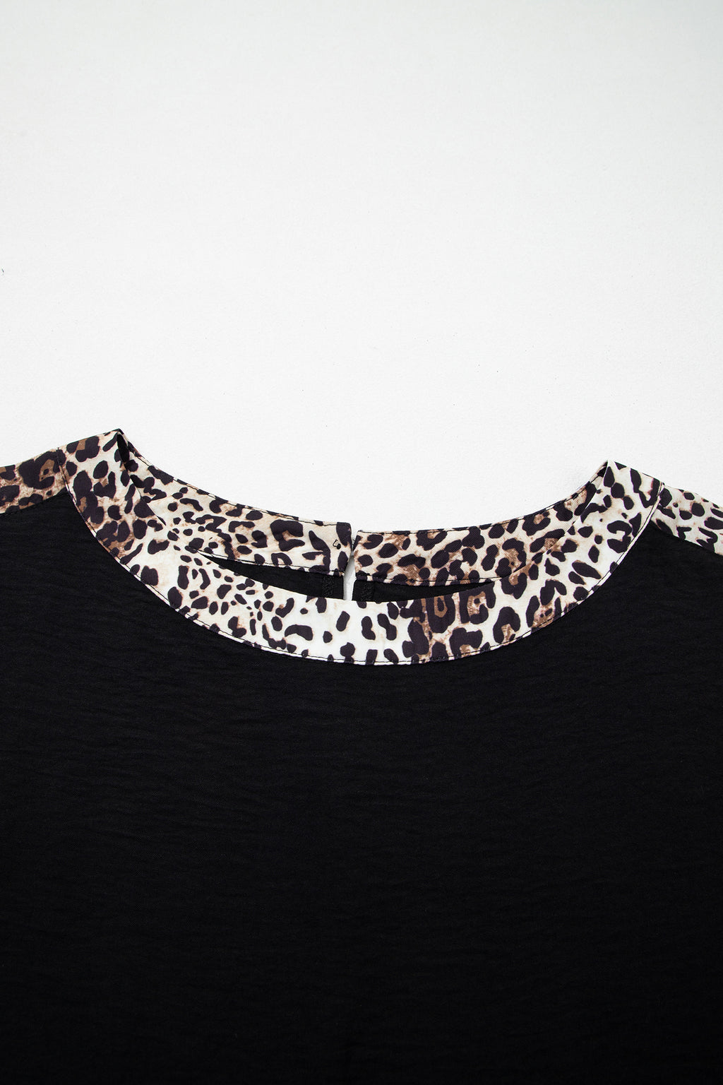 Black plus size leopard patchwork round neck loose tee by Dear-Lover, featuring a comfortable fit and stylish leopard print design.