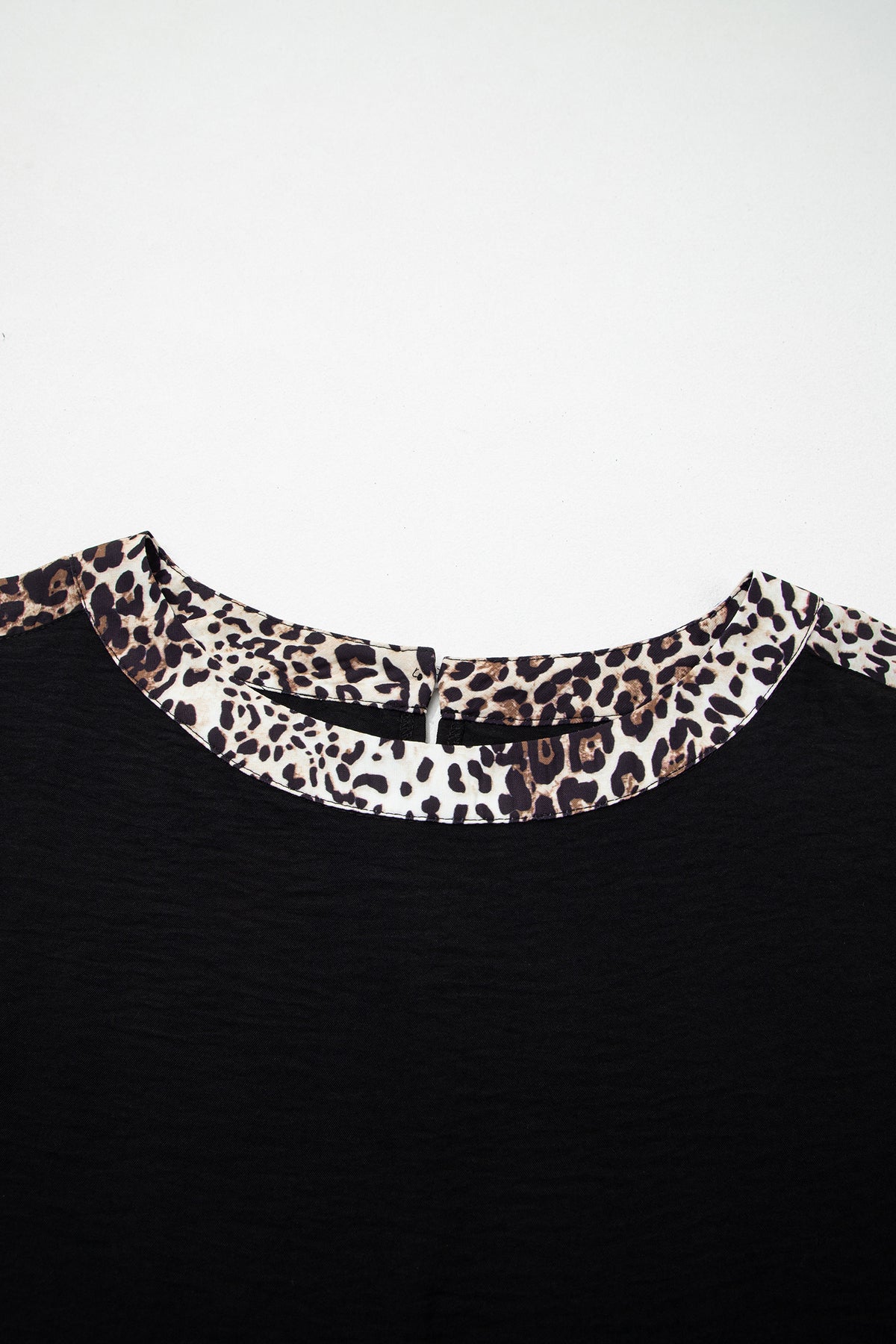 Black plus size leopard patchwork round neck loose tee by Dear-Lover, featuring a comfortable fit and stylish leopard print design.