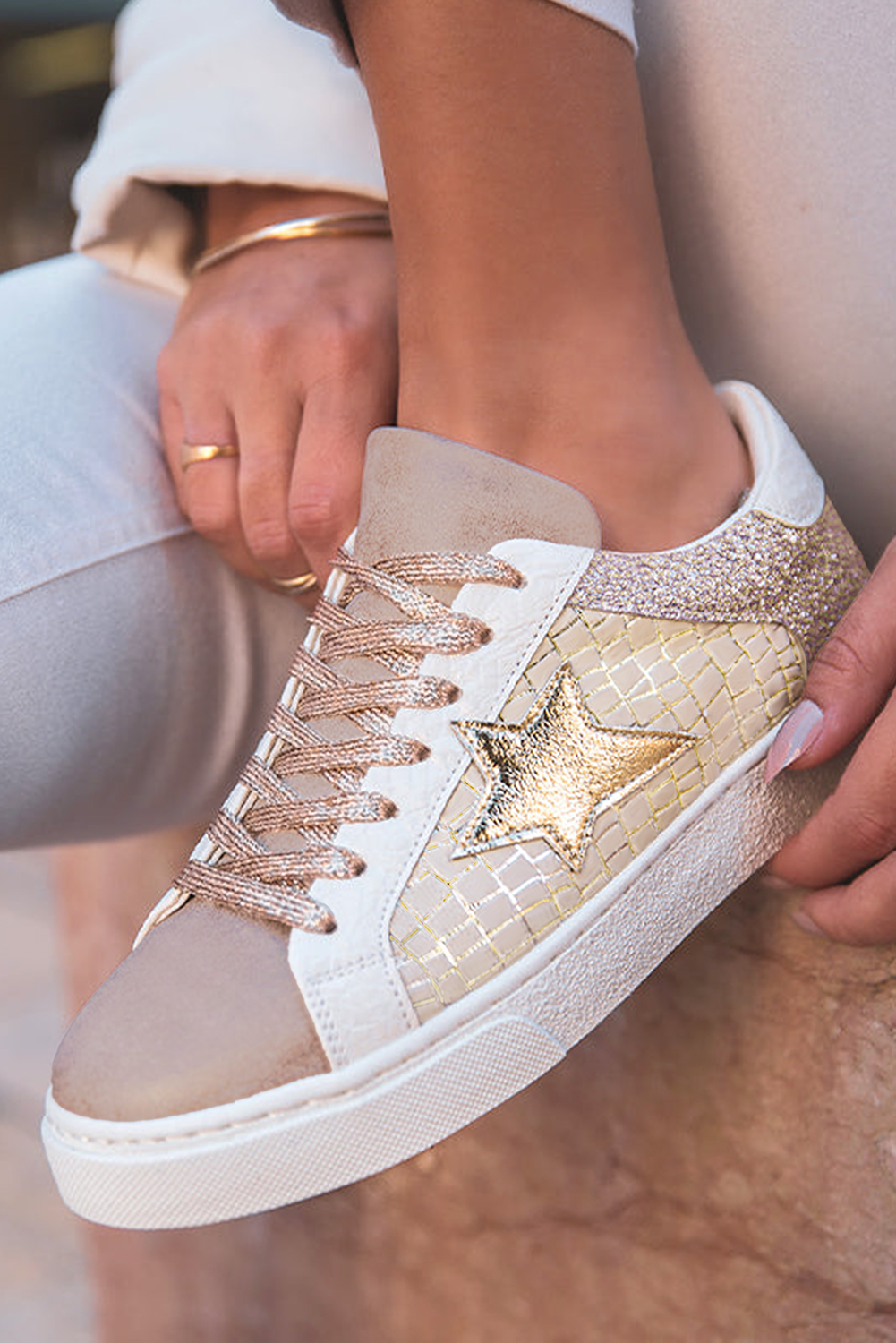 Dearlove gold glitter star patchwork PU leather lace-up sneakers for women, stylish and vibrant footwear with glitter accents.