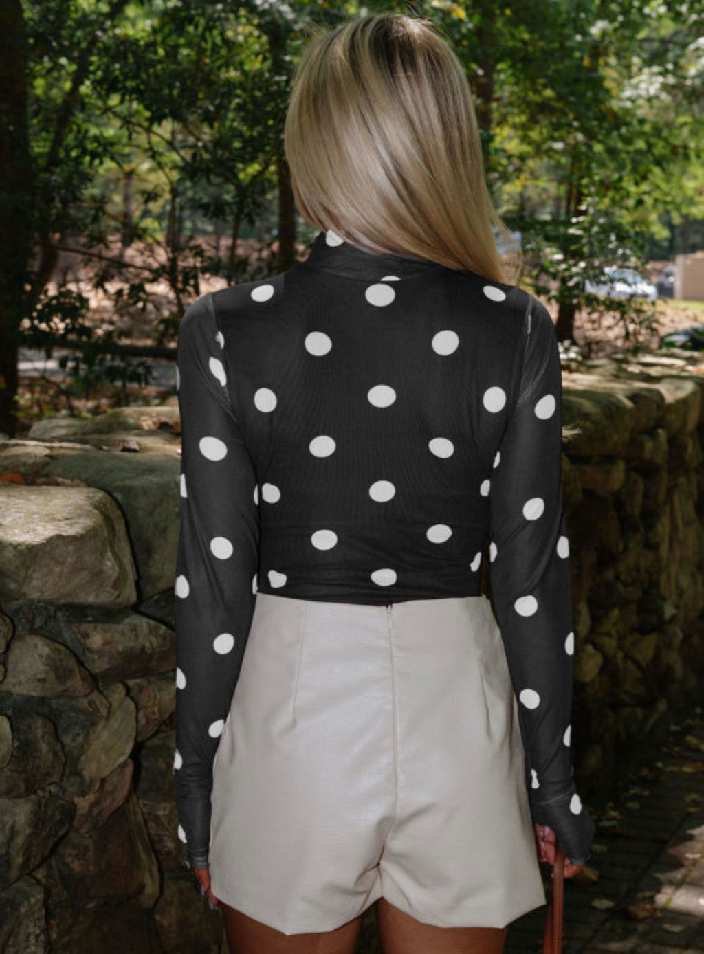 Black vintage polka dot mesh long sleeve bodysuit by Dear-Lover, featuring sheer fabric and classic dot pattern.
