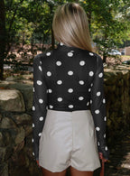 Black vintage polka dot mesh long sleeve bodysuit by Dear-Lover, featuring sheer fabric and classic dot pattern.