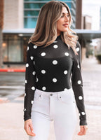 Black vintage polka dot mesh long sleeve bodysuit by Dear-Lover with a fitted design and classic pattern, perfect for stylish layering.