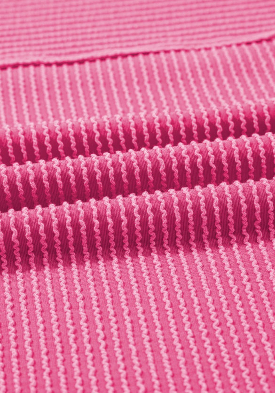 Pink Dear-Lover Rib Tee featuring a fitted design and ribbed texture, displayed on a hanger against a white background.