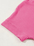 Pink Perfection Rib Tee by Dear-Lover, close-up of fitted pink ribbed cotton t-shirt with crew neckline.